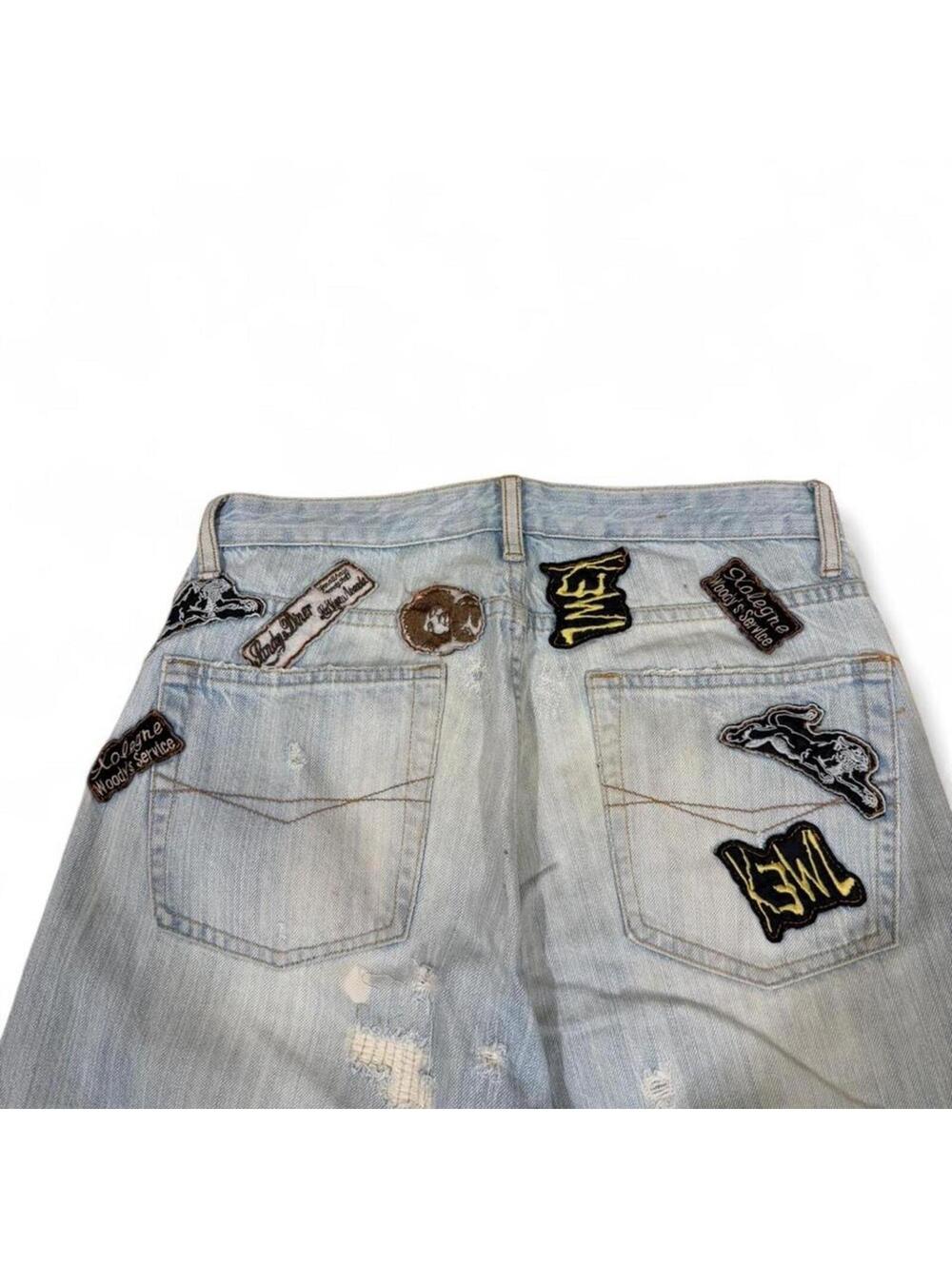 Replay Light wash denim jeans with patches and ripped look - Picture 4 of 8